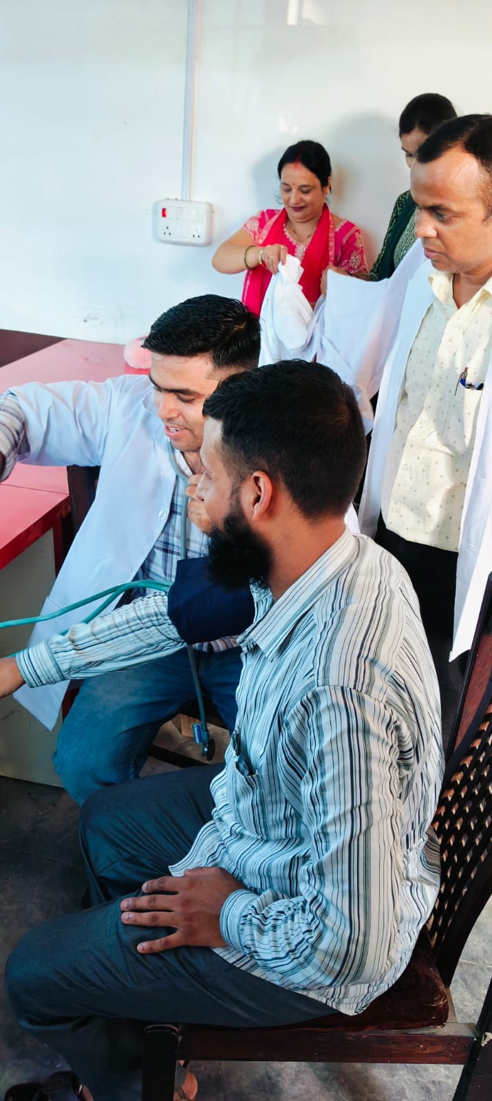 Students participating in a healthcare demonstration